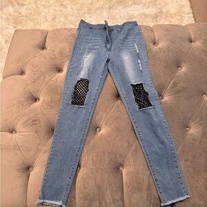 Distressed Blue Jeans with Mesh Accents